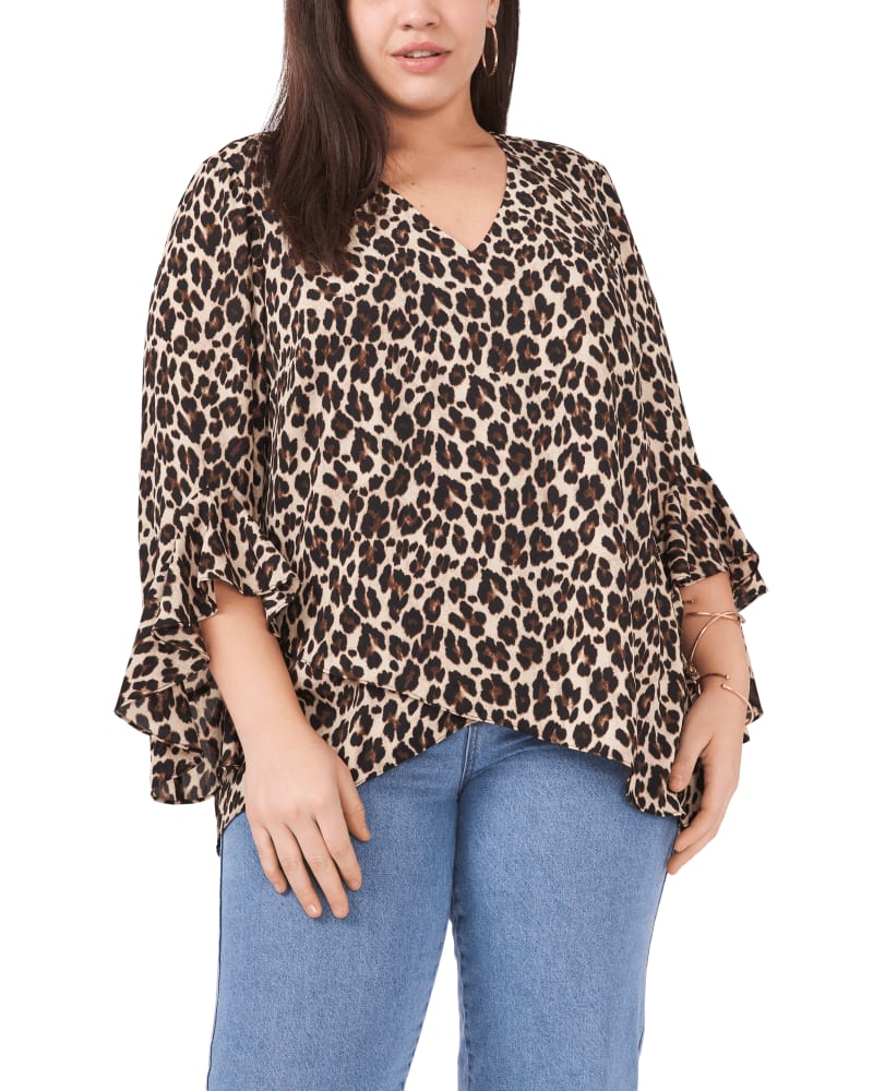 Front of a model wearing a size 1X Kylie Flutter Sleeve Blouse in Rich Black by Vince Camuto. | dia_product_style_image_id:260880